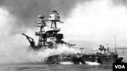 ກໍ່າປັ່ນລົບ USS Nevada ຖືກຝູງບິນຍີ່ປຸ່ນ ໂຈມຕີ ໃນວັນອາທິດ ທີ 7 ເດືອນທັນວາ ປີ 1941 ທີ່ທ່າເຮືອ Pearl Habor ລັດຮາວາຍ