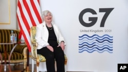 U.S. Treasury Secretary Janet Yellen poses for photographs as finance ministers from across the G7 nations meet at Lancaster House in London, June 5, 2021, ahead of the G7 leaders' summit.