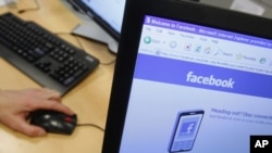 Facebook page is displayed on a computer screen (file photo)