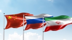 Flags of China, Russia and Iran.