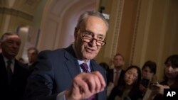 FILE - Senate Democratic Minority Leader Chuck Schumer reacts to questions from reporters on Capitol Hill in Washington, May 16, 2017. Schumer described as "laughable" suggestions by White House Communications Director Anthony Scaramucci that President Donald Trump could veto the sanctions to negotiate even tougher measures.