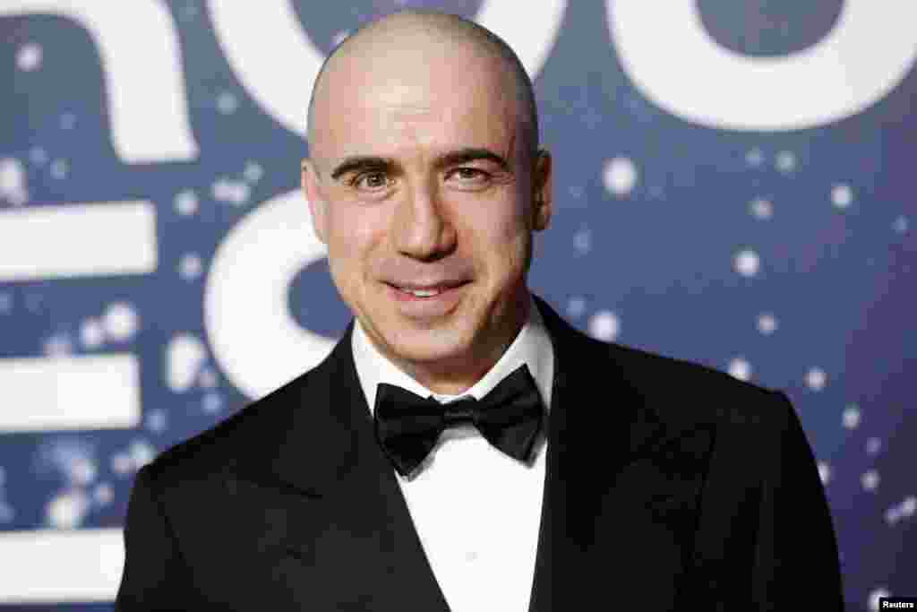 Russian entrepreneur and venture capitalist Yuri Milner arrives on the red carpet during the second annual Breakthrough Prize Awards in Mountain View, California, Nov. 9, 2014.