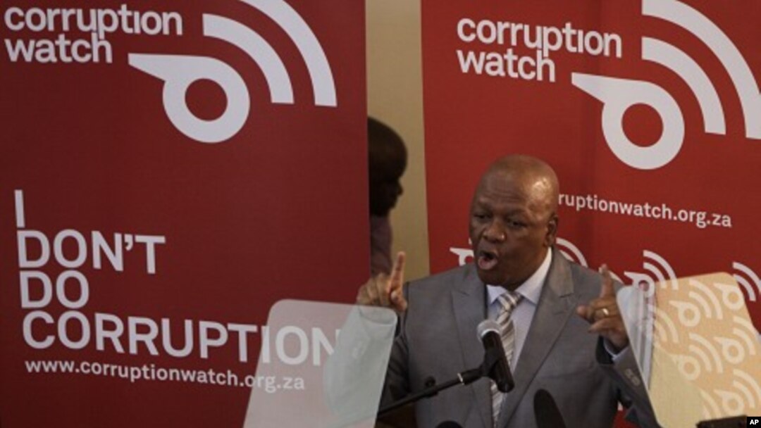 Justice Minister Jeff Radebe addresses delegates and the press attending the launch of Corruption Watch in Johannesburg, Jan. 26, 2012.