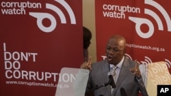 Justice Minister Jeff Radebe addresses delegates and the press attending the launch of Corruption Watch in Johannesburg, Jan. 26, 2012.