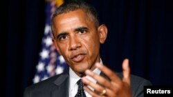 U.S. President Barack Obama makes a statement on the border crisis after his meeting with Texas Governor Rick Perry (not seen) in Dallas, July 9, 2014. 