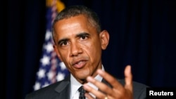 U.S. President Barack Obama makes a statement on the border crisis after his meeting with Texas Governor Rick Perry (not seen) in Dallas, July 9, 2014. 