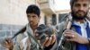 也门政府军攻击反对派武装和抗议者