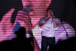 Russian opposition front-man Alexey Navalny addresses a rally in Moscow, Sept. 20, 2015.