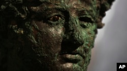 A Dionysus bust is displayed at the museum Antiquarium, in Pompeii, southern Italy, Monday, Jan. 25, 2021. (AP Photo/Gregorio Borgia)