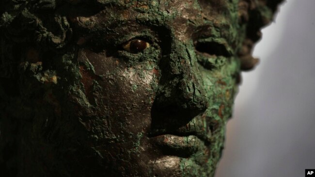 A Dionysus bust is displayed at the museum Antiquarium, in Pompeii, southern Italy, Monday, Jan. 25, 2021. (AP Photo/Gregorio Borgia)