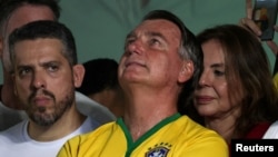FILE - Former Brazilian President Jair Bolsonaro attends a political rally for mayoral candidate Alexandre Ramagem in Rio de Janeiro, Brazil, on March 16, 2024. Bolsonaro was indicted on March 19, accused of falsifying his COVID-19 vaccination data.