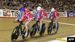 Britain's Sarah Storey, front, is a gold medal winning disabled cyclist and swimmer