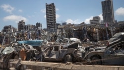 Damaged cars remain at the site of the Aug. 4 deadly blast in the port of Beirut that killed scores and wounded thousands, in Beirut, Lebanon, Aug. 17, 2020.