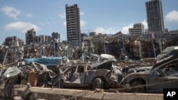 Damaged cars remain at the site of the Aug. 4 deadly blast in the port of Beirut that killed scores and wounded thousands, in Beirut, Lebanon, Aug. 17, 2020.