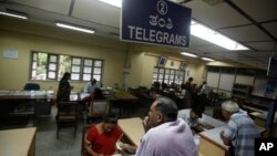 بنگلور 15جولائی: تاریخ کا حصہ بننے سے کچھ ہی لمحے قبل، ٹیلی گرام دفتر کی تصویر
