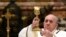 FILE - Pope Francis leads the Mass on Christmas Eve in St. Peter's Basilica amid the coronavirus disease (COVID-19) pandemic at the Vatican, Dec. 24, 2020.