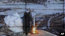 In this monitor screen image taken and released by the Korean Central News Agency and distributed in Tokyo by the Korea News Service, the Unha-3 rocket lifts off from a launch site on the west coast, in the village of Tongchang-ri, about 56 kilometers (35 miles) from the Chinese border city of Dandong, North Korea, Wednesday, Dec. 12, 2012. North Korea successfully fired a long-range rocket on Wednesday. 