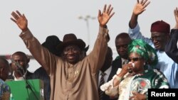 Patience Jonathan waves to supporters during a campaign rally in Abuja, March, 2011.