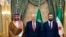 U.S. President Donald Trump, center, meets with Saudi Crown Prince Mohammed Bin Salman, left, and Interim Syrian President Ahmed al-Sharaa in Saudi Arabia, May 14, 2025.