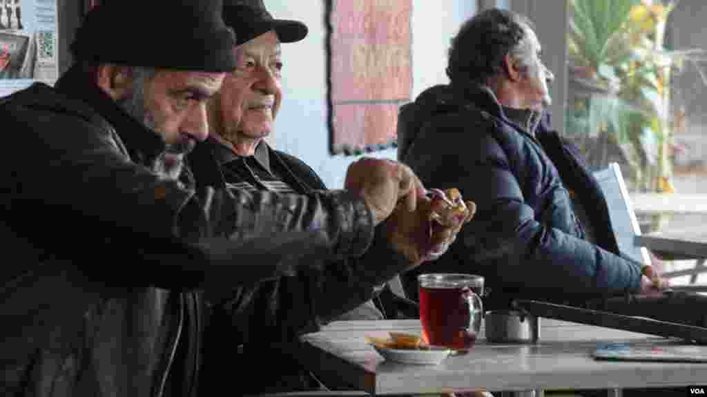 Fishermen from Skala Sikamineas, a city on Lesvos, Greece, wait for a storm to pass. (J.Owens/VOA)