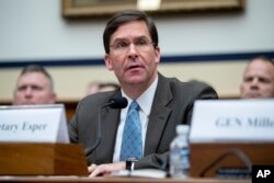 FILE - U.S. Secretary of the Army Mark Esper speaks during a House Armed Services Committee budget hearing on Capitol Hill in Washington, April 2, 2019.