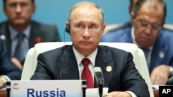 Presiden Rusia Vladimir Putin pada KTT negara-negara BRICS di Xiamen, China, Selasa (5/9).