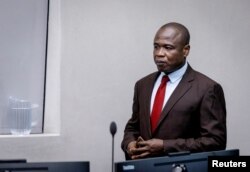 FILE —Dominic Ongwen, a former Ugandan child soldier who became a commander of the rebel Lord's Resistance Army, appears before the ICC in The Hague, Netherlands December 15, 2022.