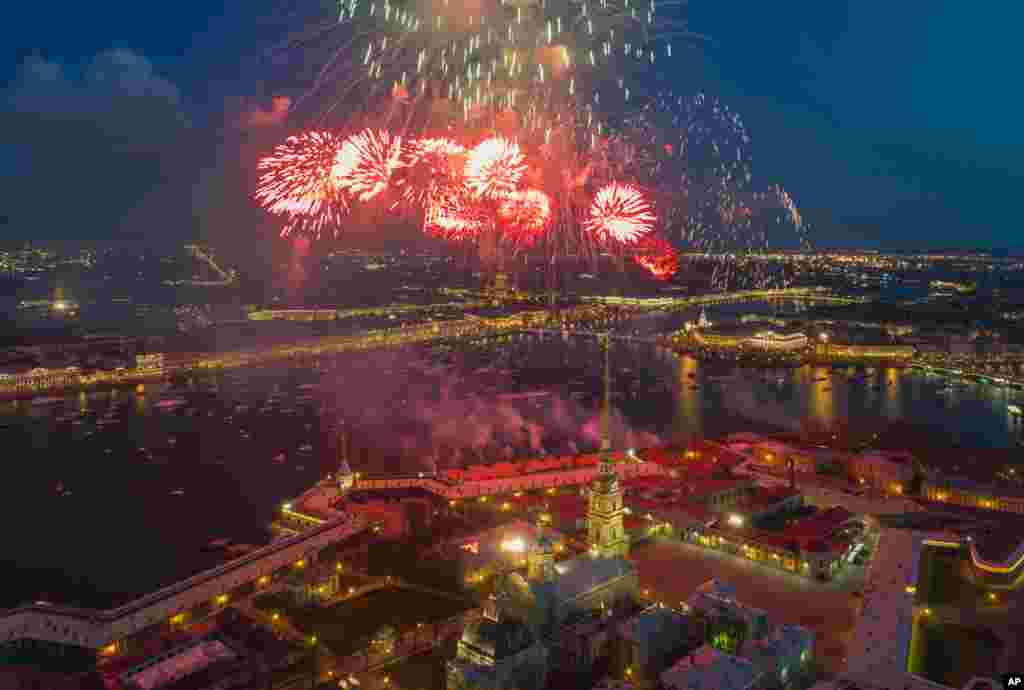 Fireworks explode over the Saint Peter and Paul Fortress and the Neva River during celebration of the 72nd anniversary of the defeat of the Nazis in World War II in St.Petersburg, Russia, May 9, 2017.
