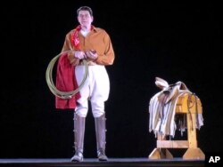 Former President Ronald Reagan appears in Western attire, as he might appear at his Santa Barbara ranch, but as a hologram, on display at the Ronald Reagan Presidential Library in Simi Valley, Calif., Oct. 10, 2018.