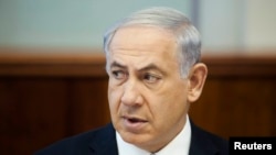 Israel's Prime Minister Benjamin Netanyahu attends the weekly cabinet meeting at his office in Jerusalem, June 1, 2014.