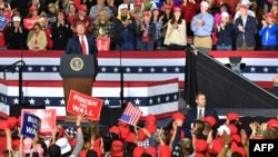 FILE - U.S. President Donald Trump speaks during a rally in El Paso, Texas, Feb. 11, 2019. The British Broadcasting Corporation has asked the White House for a review of security arrangements after a BBC cameraman was assaulted at the rally.