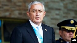 FILE - Guatemala's President Otto Perez Molina arrives at the Army general headquarters in Guatemala City, June 30, 2015. 