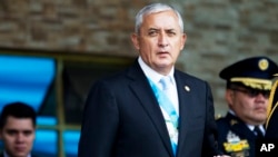 FILE - Otto Perez Molina arrives at the Guatemalan army general headquarters in Guatemala City, June 30, 2015. 