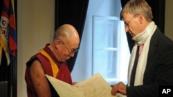 Mayor Gabor Demsky of Budapest conferring Honorary Citizenship to His Holiness the Dalai Lama at City Hall on 18 September 2010 and other images of the second day of the Budapest visit.