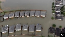 The total cost of the disaster is unclear because floodwaters are still rising, but preliminary estimates, which vary widely, run into the tens of billions of dollars.
