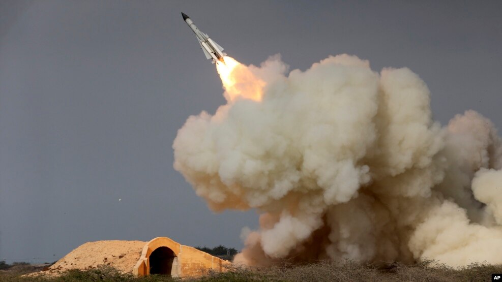 FILE - A long-range S-200 missile is fired in a military drill in the port city of Bushehr, on the northern coast of Persian Gulf, Iran, Dec. 29, 2016. President Donald Trump's national security adviser, Michael Flynn, has said the U.S. is "putting Iran on notice" after it test-fired a ballistic missile.