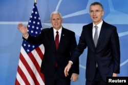 NATO Secretary-General Jens Stoltenberg welcomes U.S. Vice President Mike Pence at the NATO headquarters in Brussels, Belgium, Feb. 20, 2017.