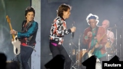 FILE - Mick Jagger, Keith Richards, Ron Wood and Charlie Watts of the Rolling Stones perform during a concert of their "No Filter" European tour at the Orange Velodrome stadium in Marseille, France, June 26, 2018.