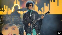 FILE - Prince performs at the Billboard Music Awards at the MGM Grand Garden Arena in Las Vegas on May 19, 2013. More than five months after Prince’s fatal drug overdose, investigators are narrowing their focus.
