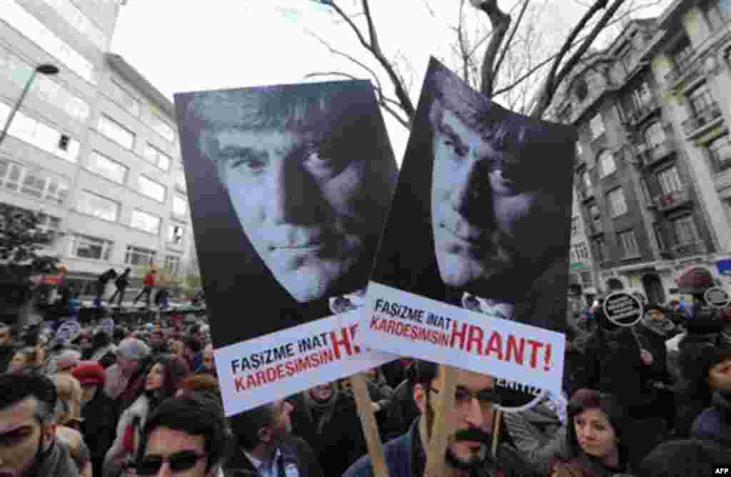 Tens of thousands of protesters march to mark the fifth anniversary of Turkish-Armenian journalist Hrant Dink's murder in Istanbul, Turkey, Thursday, Jan. 19, 2012, as outrage continues to grow over a trial that failed to shed light on alleged official ne
