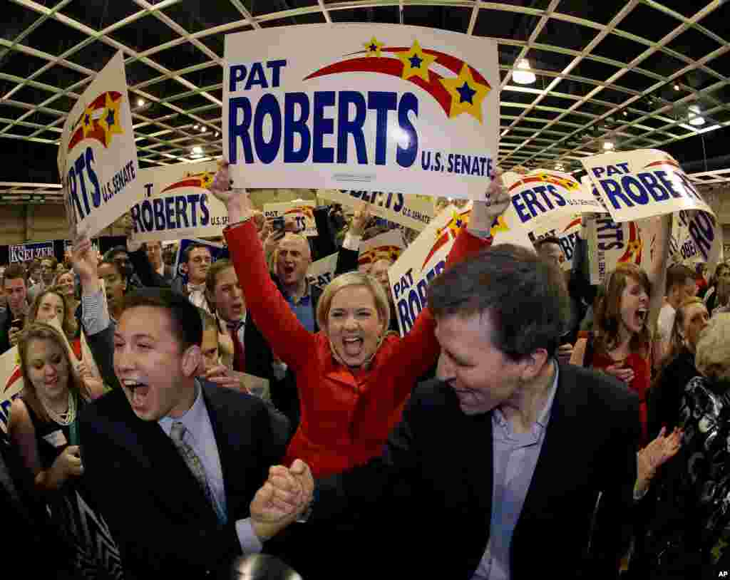 Supporters cheer before Kansas Sen. Pat Roberts makes his victory speech during a Republican watch part, Nov. 4, 2014, in Topeka. 