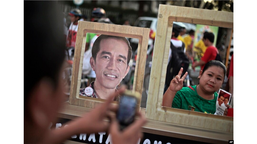 Seorang pendukung Jokowi dalam kampanye pilpres 2014, 22 Juni 2014. (Foto:dok)