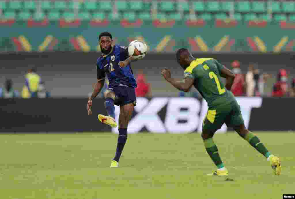 Cape Verde&#39;s Jeffry Fortes in action with Senegal&#39;s Saliou Ciss in Cameroon, Jan. 25, 2022.