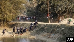 Nepalese police clash with Madhesi minority protesters at Raibiraj, Saptari District, some 240 kms southeast of Kathmandu, March 6, 2017.