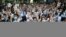 File - Anti-government protesters and students attend a demonstration in Bangkok.