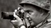 Associated Press photographer Horst Faas works in Vietnam in 1965. 
