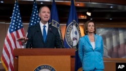 House Intelligence Committee Chairman Adam Schiff, D-Calif., speaks at a news conference with Speaker of the House Nancy Pelosi, D-Calif., at the Capitol in Washington, Oct. 2, 2019.