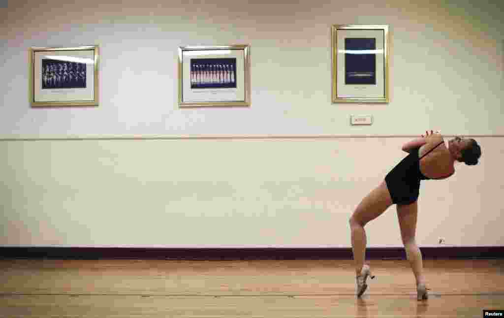 A dancer performs during an open audition to join the world famous Rockettes at New York City&#39;s Radio City Music Hall. Hundreds of aspiring dancers try out each year for a spot with the dance company to star in the Radio City Christmas Spectacular.