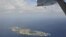 Handout photograph taken on a marine surveillance plane B-3837 shows the disputed islets, known as Senkaku in Japan and Diaoyu in China, December 13, 2012.