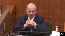 In this image from video, witness Lt. Richard Zimmerman of the Minneapolis Police Department, testifies at the trial of former Minneapolis police Officer Derek Chauvin at the Hennepin County Courthouse in Minneapolis, Minnesota, April 2, 2021.